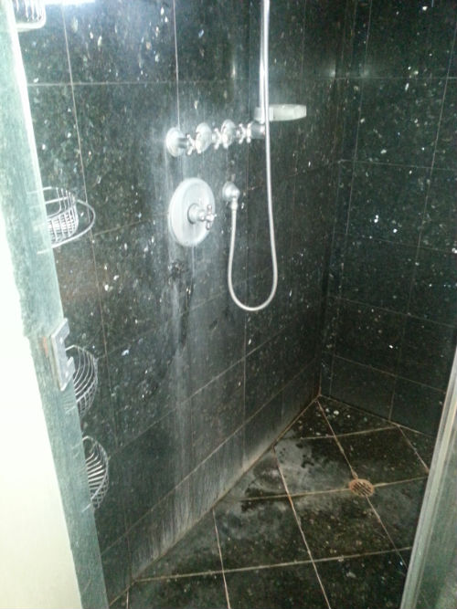 Cleaning marble slab shower walls