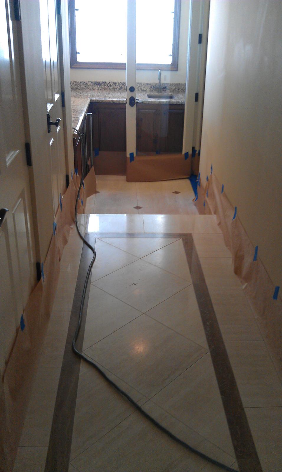 Marble kitchen countertop before honing, with a dull, worn surface
