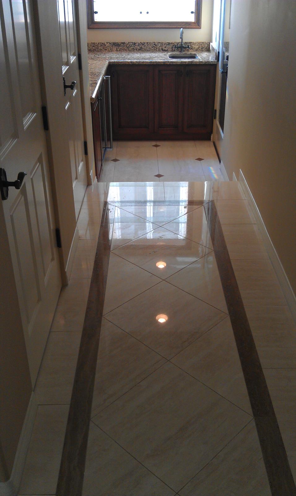 Same countertop after polishing, with a bright, reflective finish