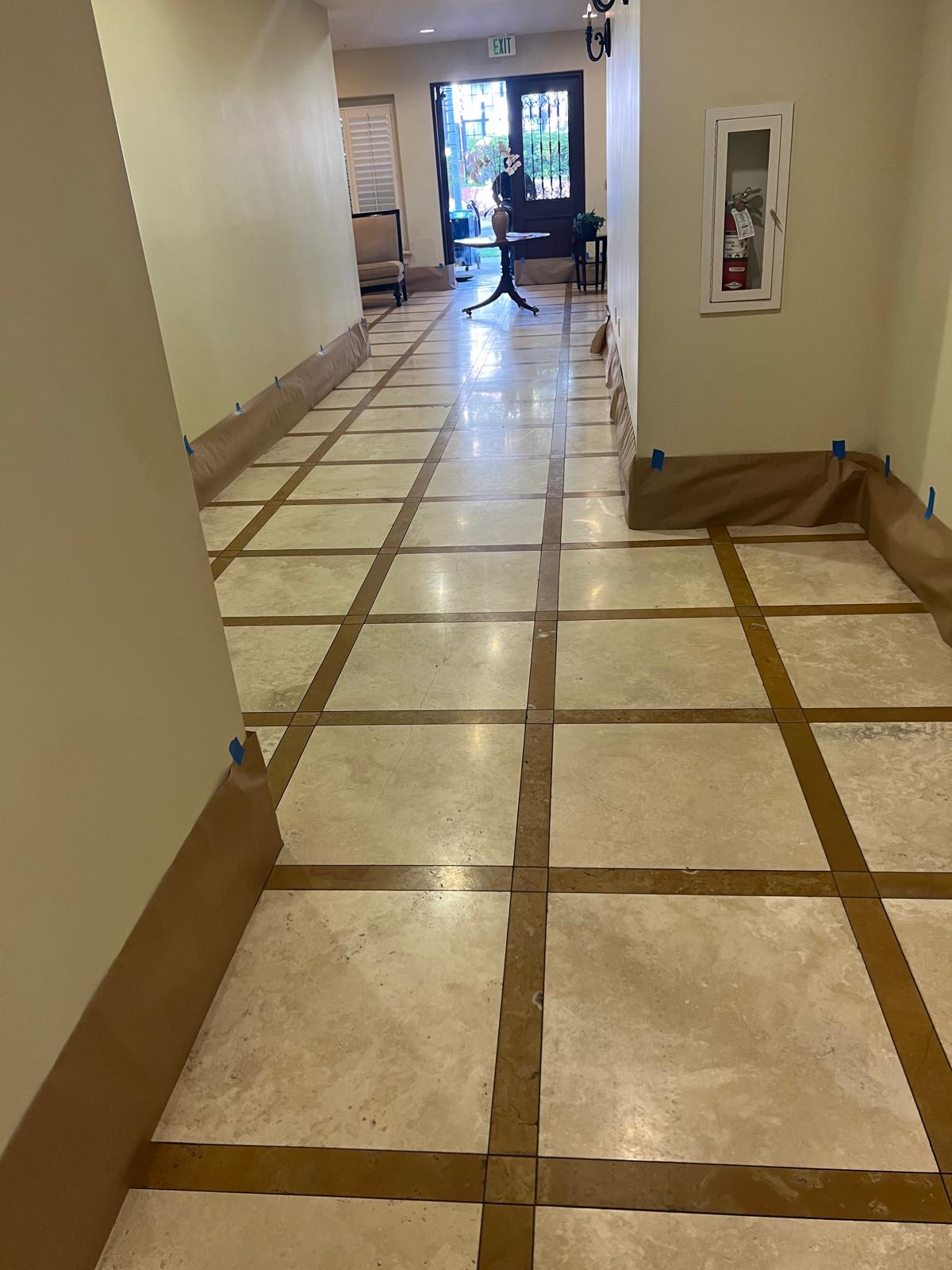 Commercial lobby marble floor prepared for polishing