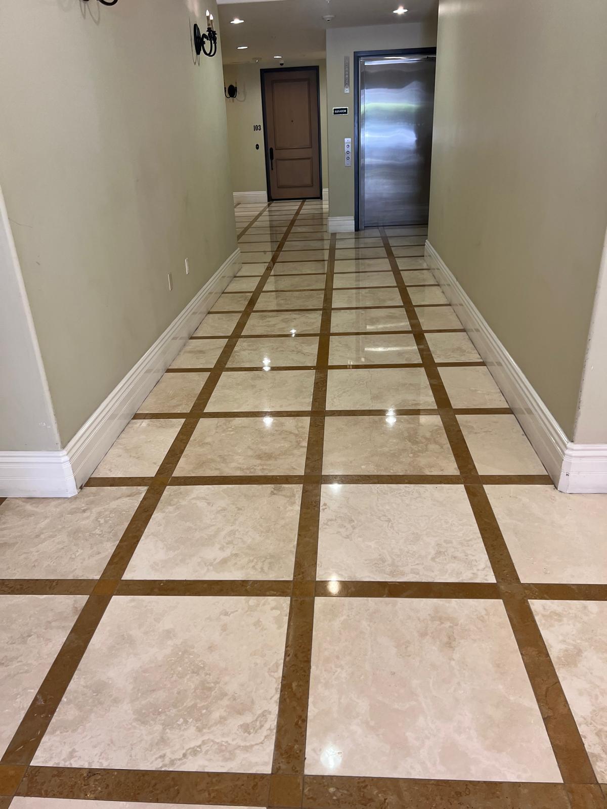 Highly polished commercial hallway marble floor