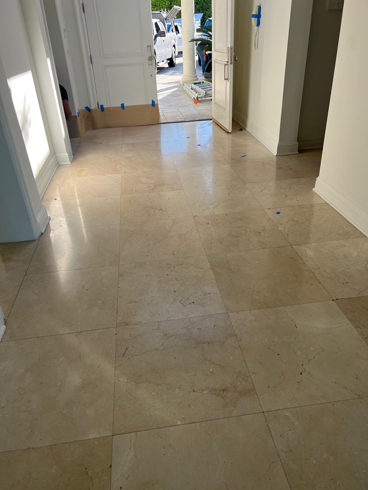 Marble floor showing a polished section during restoration