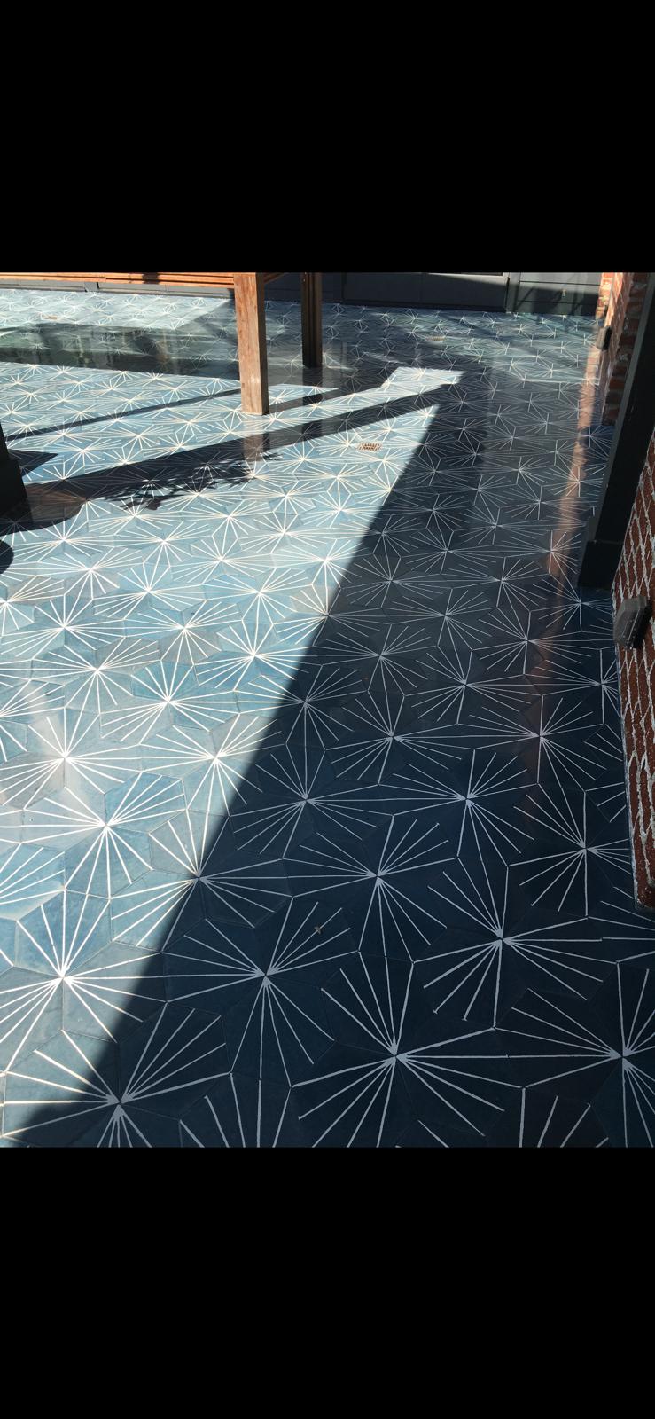 Polished geometric outdoor stone tiles in natural light