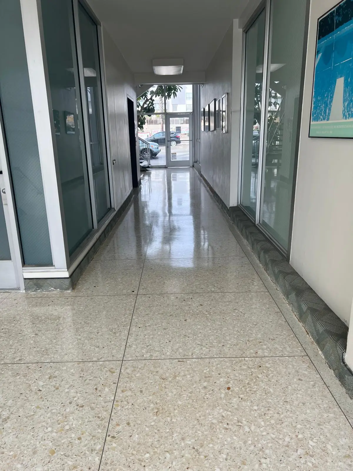 High-gloss terrazzo hallway floor after professional polishing